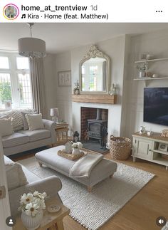 a living room filled with furniture and a fire place