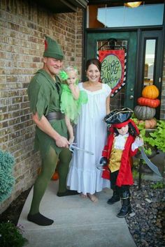 a family dressed up as peter pan and robin