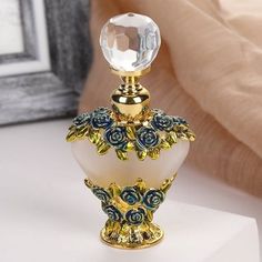 Description Discover the elegance of our vintage perfume bottle, designed with a charming shape that makes it easy to carry. This empty bottle is ideal for storing your favorite essential oils or perfumes. The exquisite design ensures a smooth application, adding a touch of sophistication to your daily routine. Features -Color:Assorted Color -Material:Glass -Size:7.70X4.00X1.60cm/3.03X1.57X0.63in -Capacity: 5 ml -The shaped design not only makes it convenient to carry but also adds a touch of so 1800s Antiques, Perfume Storage, Empty Perfume Bottles, Pretty Perfume Bottles, Vintage Containers, Perfume Bottle Design, Beautiful Perfume Bottle, Antique Perfume Bottles, Altered Bottles