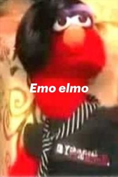 the sesame character is holding a microphone in front of an image that says emo elmo