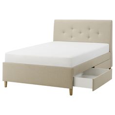 a bed with two drawers underneath it and a headboard on the bottom half of the bed