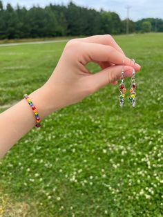 Handmade bracelet and earring set for pride month! Customs always available just message me Multicolor Pride Bracelets For Gift, Lgbtq Beaded Jewelry, Rainbow Multi-stone Bracelet Jewelry, Adjustable Rainbow Beaded Bracelets, Playful Style, Rainbow Multi-stone Bracelet, Bracelet And Earring Set, Jewellery Sets, Pride Month, Handmade Bracelet