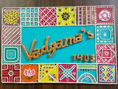 there is a cake that says vadagan's on it