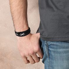 If you're looking for a unique and thoughtful way to show the eternal love you have for your grandson, this bracelet is a perfect choice. The sleek black leather strap is intricately designed with a polished stainless steel infinity symbol, representing the never-ending love between grandmother and grandson. Whether he stacks it with other bracelets or wears it alone, it's sure to become one of his favorite accessories. Why buy from us?: Crafted in Solid Surgical Stainless Steel with Leather Str Grandmother And Grandson, To My Grandson, Luxury Jewelry Brands, My Grandson, Infinity Symbol, Experience Gifts, Leather Gifts, Polished Stainless Steel, Eternal Love