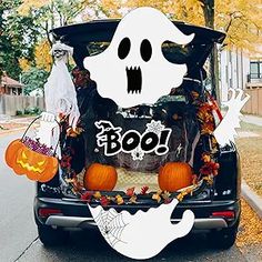 the trunk of a car decorated for halloween