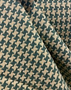 a close up view of a green and white checkered fabric