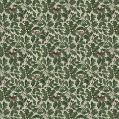 a green and white wallpaper with leaves