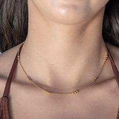 our Wildest Dreams Necklace is designed for effortless daily wear, making it a must-have for your jewelry essentials. its delicate and versatile design allows for easy layering. a dainty and versatile layering piece that will add an understated touch to any look. 18k gold pvd over 316 stainless steel water resistant 2mm beads 16.5" long with 2" extender ideal for layering Everyday Station Necklace With Satellite Chain, Dainty Station Necklace With Delicate Chain As Gift, Everyday 14k Gold-filled Necklaces With Tiny Beads, Dainty Station Necklace With Delicate Chain, Everyday 14k Gold Filled Tiny Beads Necklace, Everyday 14k Gold Filled Necklace With Tiny Beads, Delicate Tarnish Resistant Chain Necklace, Everyday 14k Gold-filled Necklace With Tiny Beads, Delicate Tarnish-resistant Chain Necklace