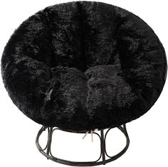 a round chair with black fur on it