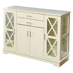 a white cabinet with glass doors and drawers on it's sides, against a white background