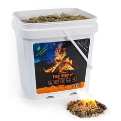 a white bucket filled with fire starter next to a spoon