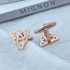 Elevate his style with our Viking Cufflinks in Stainless Steel, intricately designed with Eternal Celtic Knots. Perfect for weddings, these luxurious cufflinks are available in Gold, Rose Gold, or Silver, making them an ideal designer gift for your husband. Authentic craftsmanship meets timeless elegance. Discover Personalized Perfection Explore our collection of personalized cufflinks, featuring unique custom and engraved designs perfect for weddings and special occasions. Our sterling silver c Husband Clothes, Wedding Cuff Links, Wedding Cuff, Personalized Cufflinks, Celtic Knots, Cufflinks Wedding, Charm Making, Gift For Husband, Silver Cufflinks