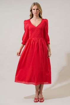 The Zelda Smocked Long Sleeve Midi Dress is a perfect piece to transition seasons and look fantastic! Long sleeves with smocked cuffs frame a smocked bodice with a v-neckline. The bottom skirt creates pleats and a flowy fit. Add on gold jewelry and matching heels or loafers. - Smocked bodice- V-neck- Puffed long sleeves- Pockets- Comes in 3 colorsSize + Fit - Model is 5'10" and wearing size XS- Measurements taken from size S - Chest: 14"- Length: 49" Fabric Self: 100% Cotton, Lining: 97% Polyest Puffed Long Sleeves, Puff Long Sleeves, Red Midi Dress, Sleeve Midi Dress, Long Sleeve Midi, Cotton Voile, Long Sleeve Midi Dress, Wedding Season, Sleeve Cotton