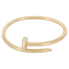 Brand Cartier Style Nail Material 18K Yellow Gold with Diamonds Brilliant cut Diamonds totaling 0.58ct Diamond estimated quality: EF/VS Bracelet Size 17 Bracelet Weight 31.5gr Bracelet width 3.5mm Mint Condition Like, new Comes with Cartier Bracelet Box Red Heels Cartier Bracelet, Luxury Cartier Gold Bracelet With 17 Jewels, Luxury Elegant Cartier Bracelet, Cartier Nail Bracelet, Nail Bracelet, Cartier Bracelet, Bracelet Box, Diamond Sizes, Bracelet Sizes