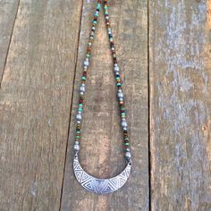 Bohemian Crescent Metal Necklaces, Adjustable Silver Bohemian Beaded Necklace, Bohemian Beaded Crescent Jewelry, Bohemian Silver Beaded Necklaces, Bohemian Crescent Beaded Jewelry, Adjustable Crescent Necklaces For Festivals, Silver Tiny Beads For Festival, Bohemian Jewelry With Spacer And Metal Beads, Bohemian Necklace With Spacer And Metal Beads