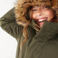 A Fully Seam-Sealed And Waterproof Jacket Is Warmed With 550-Fill-Power Down Insulation And Trimmed With Removable Faux Fur Around The Insulated Hood. An Elastic-Cinched Waist Helps To Keep The Chill At Bay. Runs Small; For A More Relaxed Fit, Order One Size Up. - Front Zip Closure With Hook-And-Loop Storm Placket - Three-Piece Fixed Hood With Removable Faux-Fur Trim - Interior Fleece Cuffs - Front Snap-Welt Pockets; Interior Hook-And-Loop Media Pocket - 75-Denier 155 G/M Dryvent 2-Layer Woven D The North Face Jackets Green, Rain Snap, Layered Weave, Waterproof Jacket, Body Heat, Parka Jacket, Women's Coats & Jackets, North Face Jacket, Three Piece