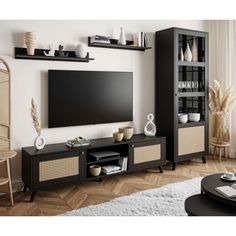 a black entertainment center with wicker baskets on the bottom shelf and shelves above it