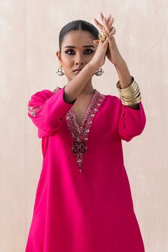 Hot pink kaftan with bead sequin embellished floral motifs. Comes with pant. - Aza Fashions Bollywood Style Pink V-neck Sets, Pink Bollywood V-neck Sets, Pink Kaftan For Party Festivals, Pink Kaftan For Party And Festivals, Pink Party Kaftan For Festivals, Embellished Pink Georgette Palazzo Set, Pink Sequined Kurta For Festivals, Pink Sequined Kaftan For Party, Pink Bollywood Sequined Palazzo Set