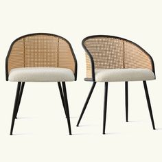 two chairs with black legs and white upholstered backrests, side by side