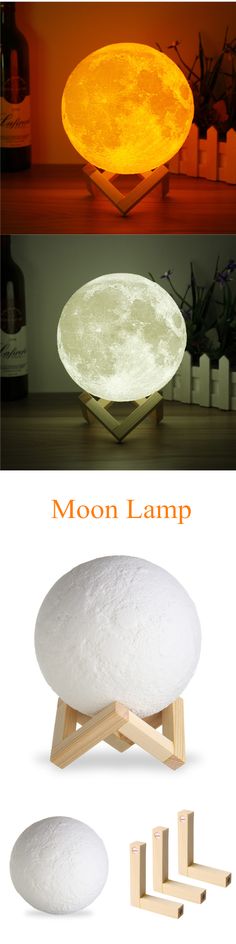 the moon lamp is sitting on top of a table