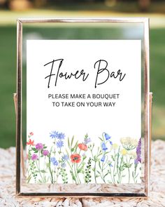 a sign that says flower bar please make a bouquet to take on your way