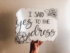 someone holding up a sign that says i said yes to the dress