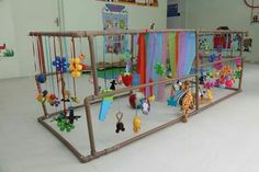 an indoor play area with toys and stuffed animals