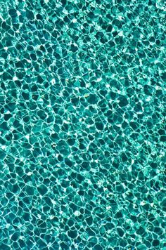 an overhead view of the water in a swimming pool