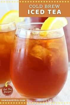 two glasses filled with iced tea sitting on top of a table