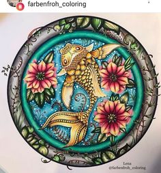 a drawing of a fish in a circle with flowers