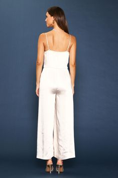 This strappy cowl-neck jumpsuit is a chic statement for this season's special occasions. It's got a beautiful drape up top and a breezy wide-leg silhouette. •Cowl neckline  •Adjustable spaghetti straps  •Pleated front  •Wide-leg silhouette  •Hidden zipper at back  Item Number: 74292 Satin Jumpsuit, Cowl Neckline, Beautiful Drapes, Item Number, Hidden Zipper, Cowl Neck, Size 16, Spaghetti Strap, Champagne