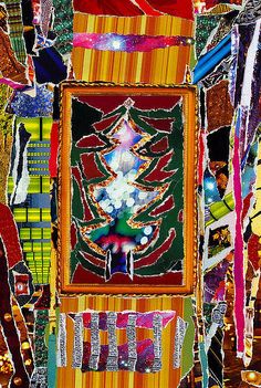 an abstract christmas tree made out of many different colored pieces of glass and tinsel