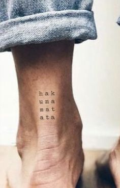 a person with a small tattoo on their foot that says make it matter at all times