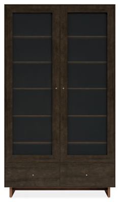 an image of a bookcase with glass doors