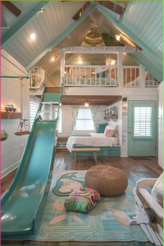 a bedroom with a slide in the middle and a loft bed on the other side