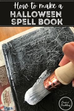 how to make a halloween spell book with an old - fashioned paintbrush and paper