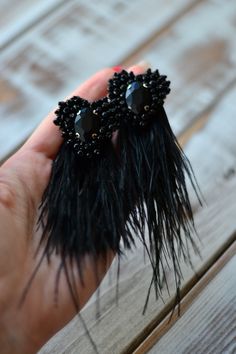 Black feather heart earrings Natural ostrich tassel Watterfall beaded crystal clip on earrings Bohemian boho Statement beadwork jewelry Handmade Party Clip-on Earrings, Elegant Feather Dangle Earrings, Elegant Dangle Feather Earrings, Party Feather Dangle Jewelry, Elegant Feather Dangle Jewelry, Party Jewelry With Feather Dangles, Elegant Handmade Clip-on Earrings For Party, Elegant Dangle Earrings With Feathers, Party Jewelry With Dangle Feathers