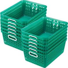 two green plastic baskets sitting side by side