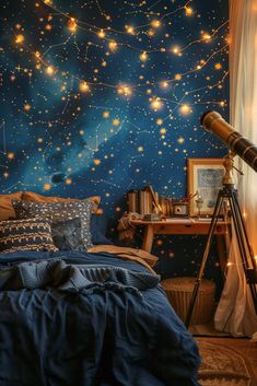 a bedroom decorated in blue and gold with stars on the wall, lights strung from the ceiling