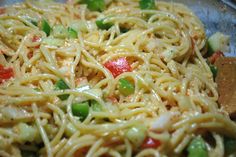 pasta with vegetables and sauce in a pan