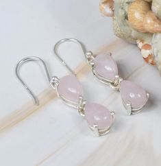 Natural Pink Rose Quartz 925 Sterling Silver Gemstone Hook Earring ~ Natural Stone ~ October Birthstone ~ Gift For Her ~ 2 Stone Earring The Stud is stamped 925. Length:- 3.5 Centimeter Width- 0.6 Centimeter weight- 3.8 Gram We Assure you the quality and the special properties of silver and the stone.  About Pink Rose Quartz - The Rose Quartz meaning is greatly connected to its pink color. Pink represents gentleness, calmness, femininity, compassion and love. The gentle energy it carries support Rose Quartz Meaning, Quartz Meaning, Pink Rose Quartz, Dainty Pendant, Birthstone Gifts, Mystic Topaz, 925 Sterling Silver Chain, October Birthstone, October Birth Stone