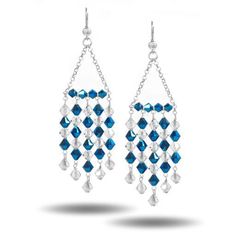 pair of earrings with blue and white crystals on the sides, hanging from silver chains