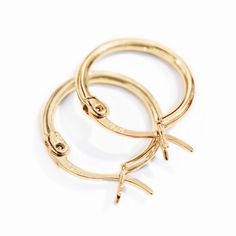 Classic 14K Gold Vermeil hoop earrings that elegantly hang from your ear. Easy to put on and take off. Great to pair with smaller Huggies. FROM PHOTO: Endless, Hinge, Latch Gold Vermeil Hypoallergenic, lead and nickel free Thickness Sizes: 1.3mm Outside Diameter Sizes: 15mm, 18mm, 20mm Latch, Click to close #E571-G Pretty Ear Piercings, Small Gold Hoop Earrings, Small Gold Hoops, Small Hoop Earrings, Earrings Hoop, Huggie Earrings, Gold Hoop, Gold Hoop Earrings, Huggies Earrings