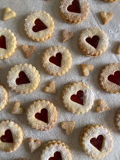 heart shaped cookies are arranged on a sheet of paper