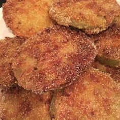 some fried food is on a white plate