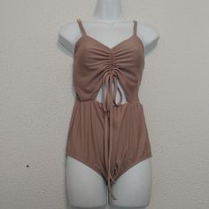 Reb Dolls Amara Taupe Drawstring Cut Out Adjustable Strap One Piece Swimsuit Sz M 6-8 Nwt 95% Polyester 5% Spandex 14" Pp 17" Long. Color May Vary G2 Beige One-piece Bodysuit For Party, Sleeveless Beige Bodysuit For The Beach, Beige Sleeveless Bodysuit For Beach, Beige Sleeveless Bodysuit For The Beach, Summer Backless Bodysuit For Loungewear, Summer Beach Ruched Jumpsuits And Rompers, Backless Bodysuit For Summer Loungewear, Summer Beach Jumpsuits And Rompers With Drawstring, Summer Loungewear Backless Bodysuit