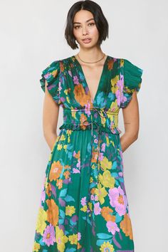 This dress is so striking—first of all, that floral print is an absolute showstopper with its colored effect. But it doesn't stop there. The dress has tons of tiny pleats at the bodice, dainty ties, and fluttery pleated sleeves, all before flowing to a shin-skimming length. •V-neckline •Pleated bodice •Short sleeves •Tie detailing at front •Elasticized waist •Original 'Floral Abstraction' print, designed by Current Air DIMENSIONS •Standard: 51" Length Item number 2290084-2 100% Polyester Hand Wa Tara Dress, Color Combinations For Clothes, Pleated Sleeves, Pleated Bodice, Dressy Dresses, Pleated Midi Dress, Print Trends, Green Midi Dress, Colourful Outfits