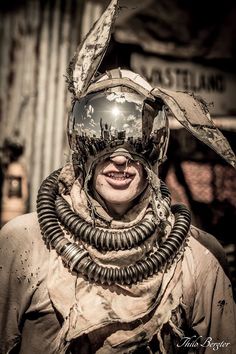 a man wearing a helmet and goggles on top of his head