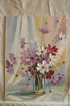 a painting of pink and white flowers in a glass vase on a tan cloth background