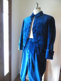 To be handmade and built for you is this custom 1700s frock coat set for men. Set is shown in deep blue velvet. I can build this set in most any color of velvet fabric. This set can be built in your choice of colors and fabrics You are not limited to the set in the pictures. This set requires from 4 weeks to 8 weeks lead time after orders and payments. This set can be used for weddings, wedding attire, cosplay, Marie Antoinette events, colonial events, festivals, costume conventions, 18th centur Frock Coat Men, Men Waistcoat, Coat Set, 18th Century Clothing, Frock Coat, Coat Men, Century Clothing, Mens Costumes, Marie Antoinette